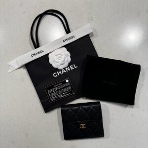 CHANEL Classic Small Flap Wallet in Black Caviar Leather & Gold-Tone Metal